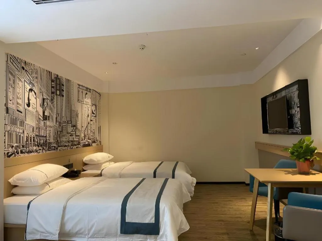 Bed in City Comfort Inn Wuhan Yangluo Wanda Plaza