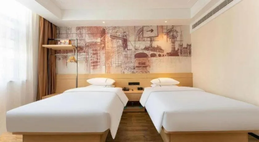 Bed in City Comfort Inn Wuhan Yangluo Wanda Plaza