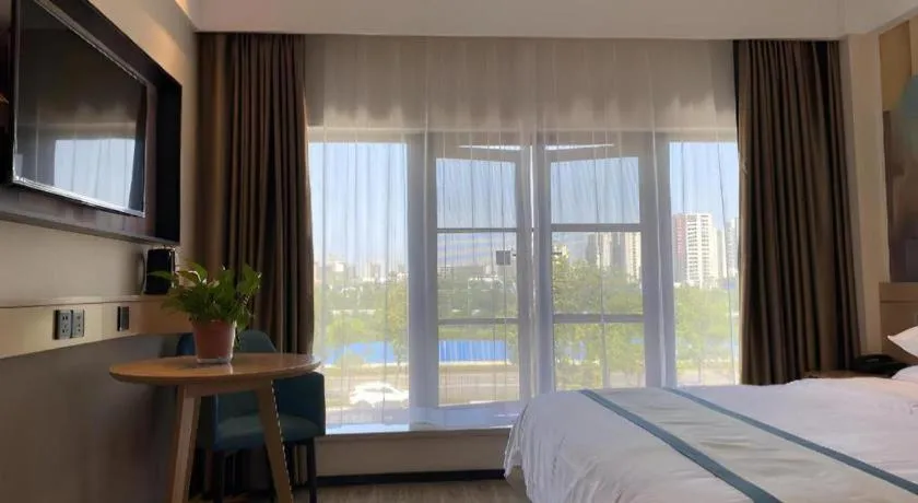 Bed in City Comfort Inn Wuhan Yangluo Wanda Plaza