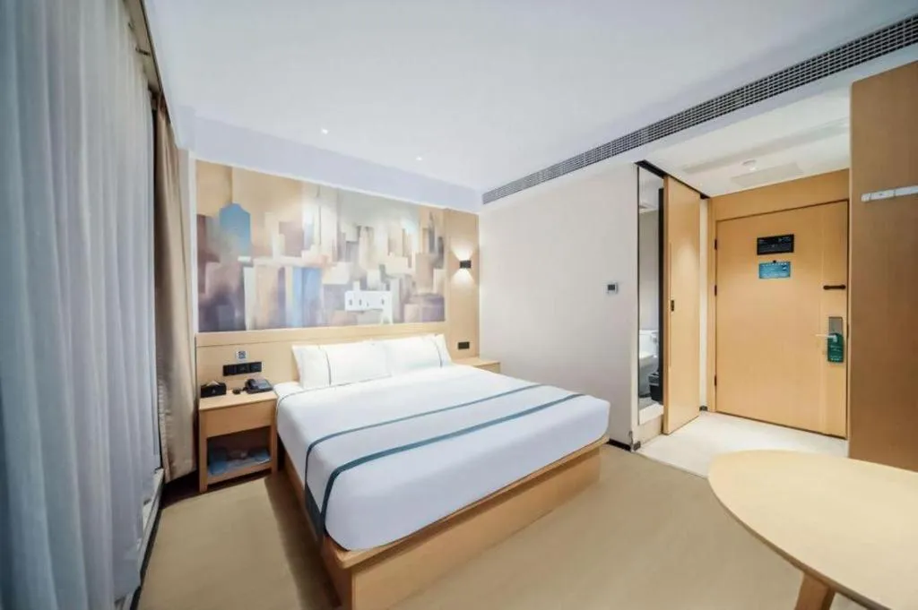 Bed in City Comfort Inn Wuhan Yangluo Wanda Plaza