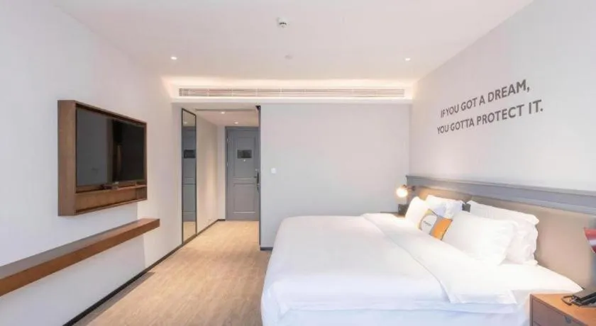 Bed in City Comfort Premier Hotel Nanning Guangxi University Zoo Metro Station