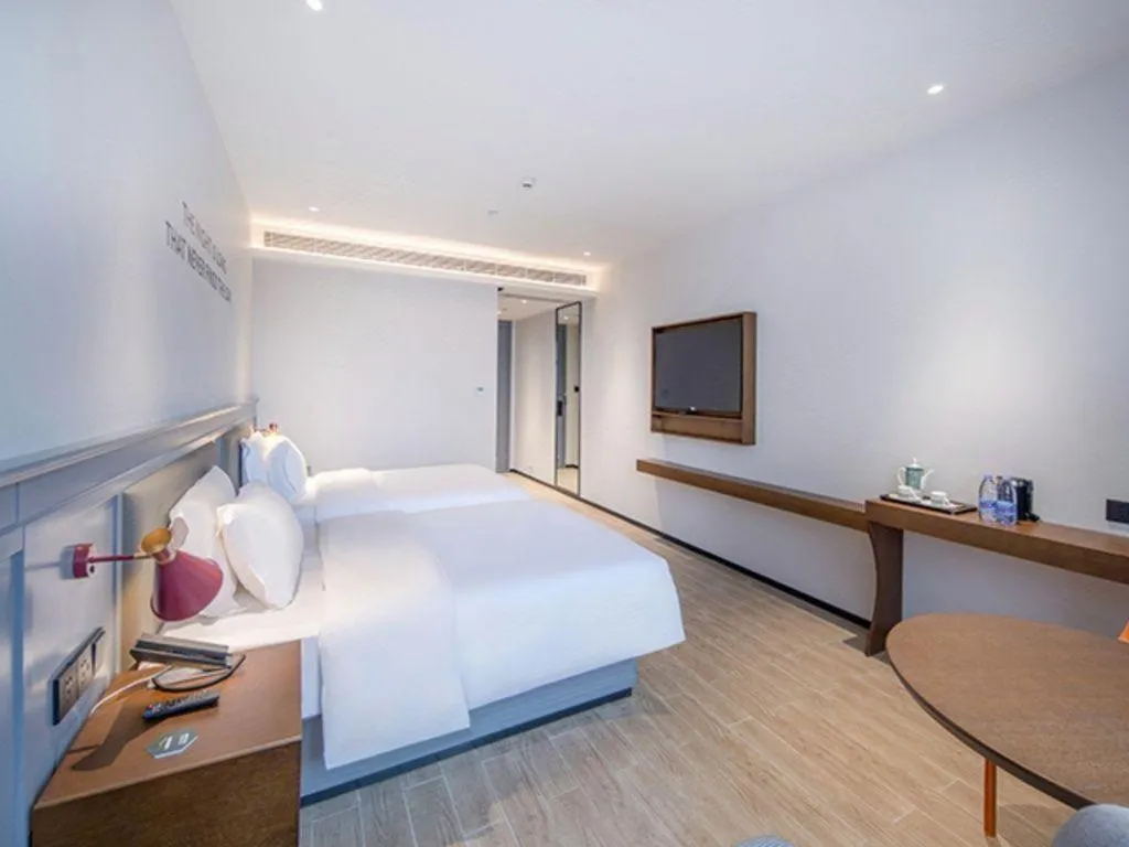 Bed in City Comfort Premier Hotel Nanning Guangxi University Zoo Metro Station