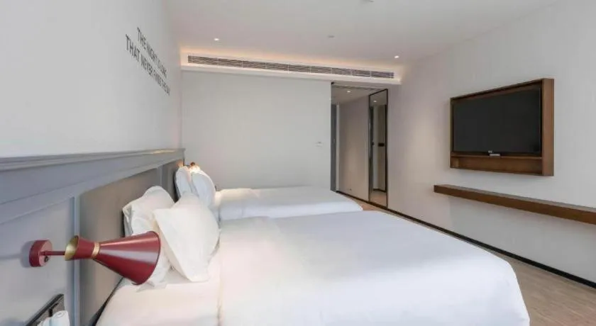 Bed in City Comfort Premier Hotel Nanning Guangxi University Zoo Metro Station