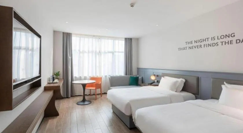 Bed in City Comfort Premier Hotel Nanning Guangxi University Zoo Metro Station