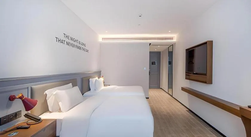 Bed in City Comfort Premier Hotel Nanning Guangxi University Zoo Metro Station