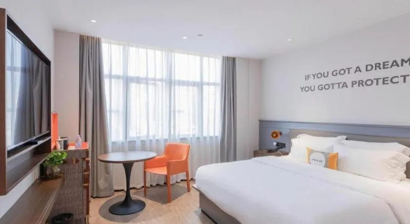 Bed in City Comfort Premier Hotel Nanning Guangxi University Zoo Metro Station