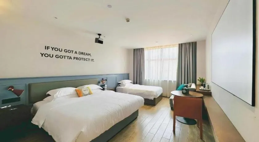 Bed in City Comfort Premier Hotel Nanning Guangxi University Zoo Metro Station