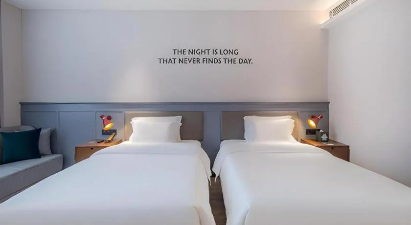 Bed in City Comfort Premier Hotel Nanning Guangxi University Zoo Metro Station