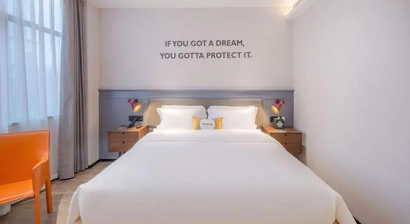 Bed in City Comfort Premier Hotel Nanning Guangxi University Zoo Metro Station