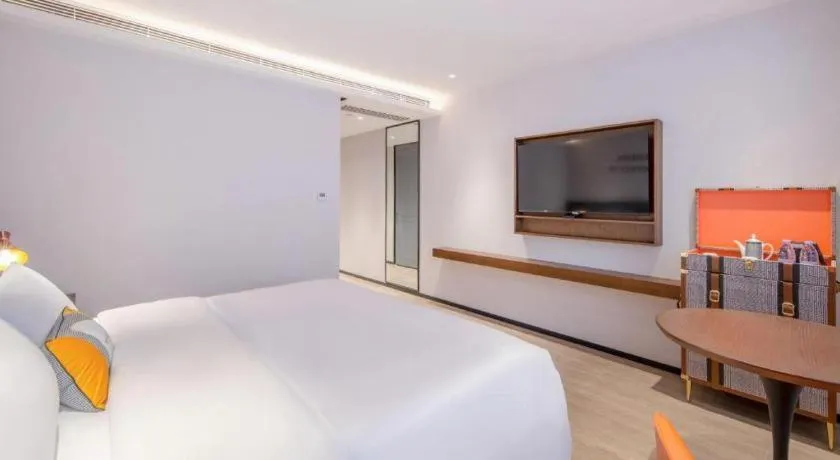 Bed in City Comfort Premier Hotel Nanning Guangxi University Zoo Metro Station