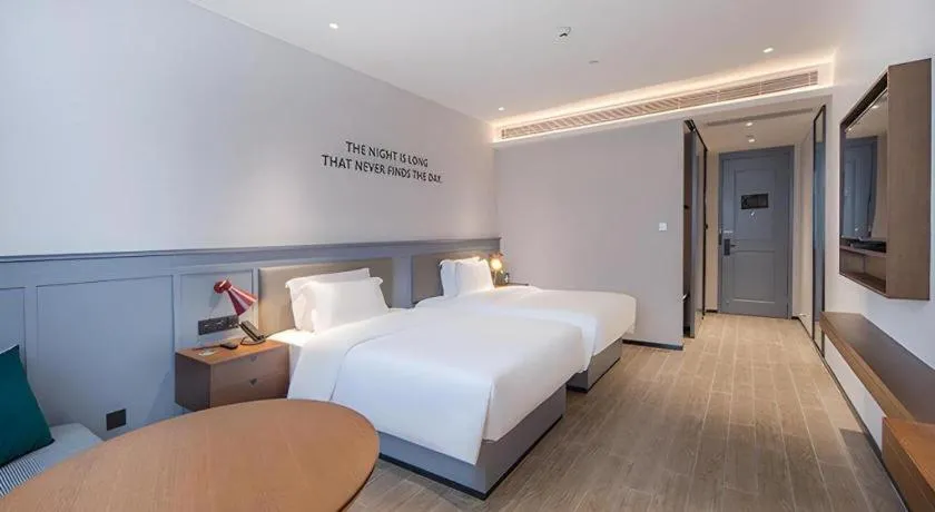 Bed in City Comfort Premier Hotel Nanning Guangxi University Zoo Metro Station