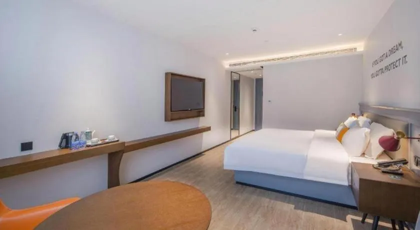 Bed in City Comfort Premier Hotel Nanning Guangxi University Zoo Metro Station