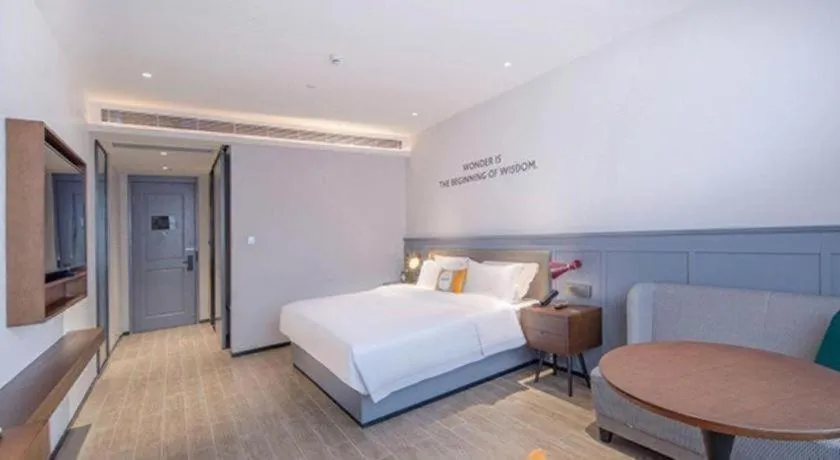 Bed in City Comfort Premier Hotel Nanning Guangxi University Zoo Metro Station