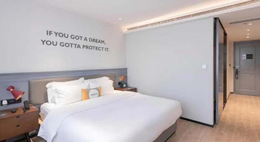 Bed in City Comfort Premier Hotel Nanning Guangxi University Zoo Metro Station