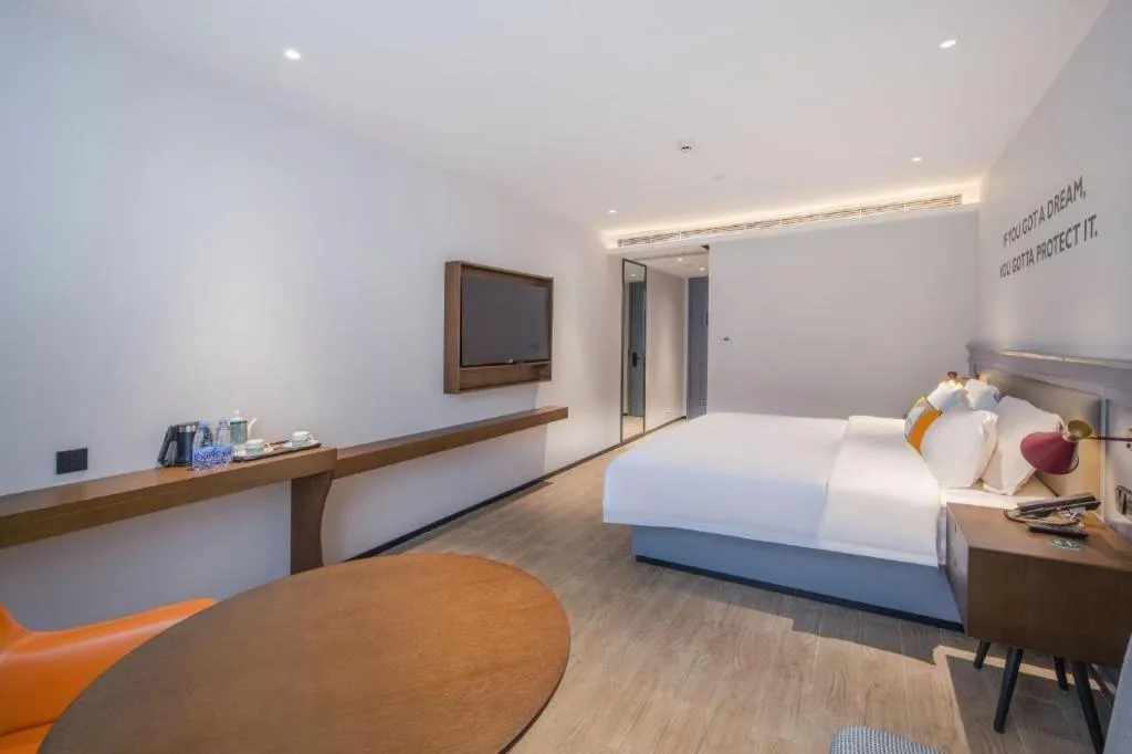 Bed in City Comfort Premier Hotel Nanning Guangxi University Zoo Metro Station