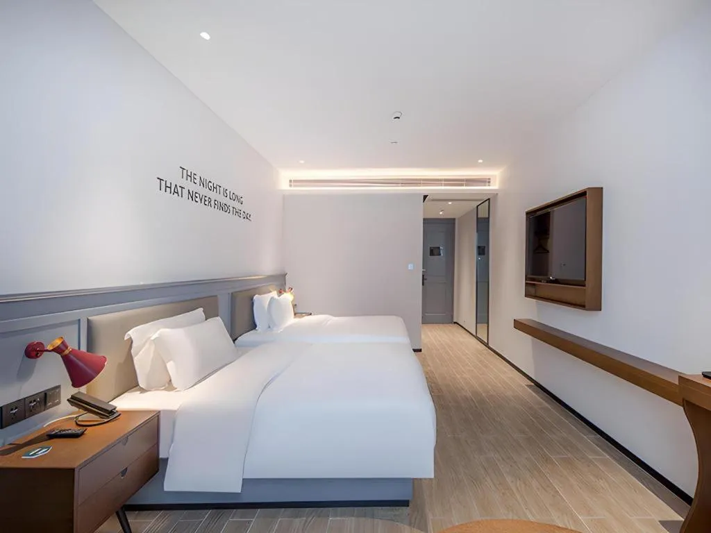 Bed in City Comfort Premier Hotel Nanning Guangxi University Zoo Metro Station