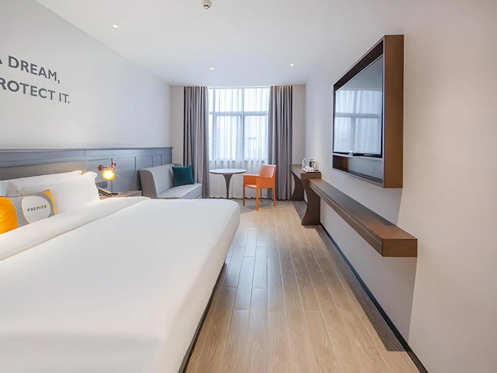 Bed in City Comfort Premier Hotel Nanning Guangxi University Zoo Metro Station