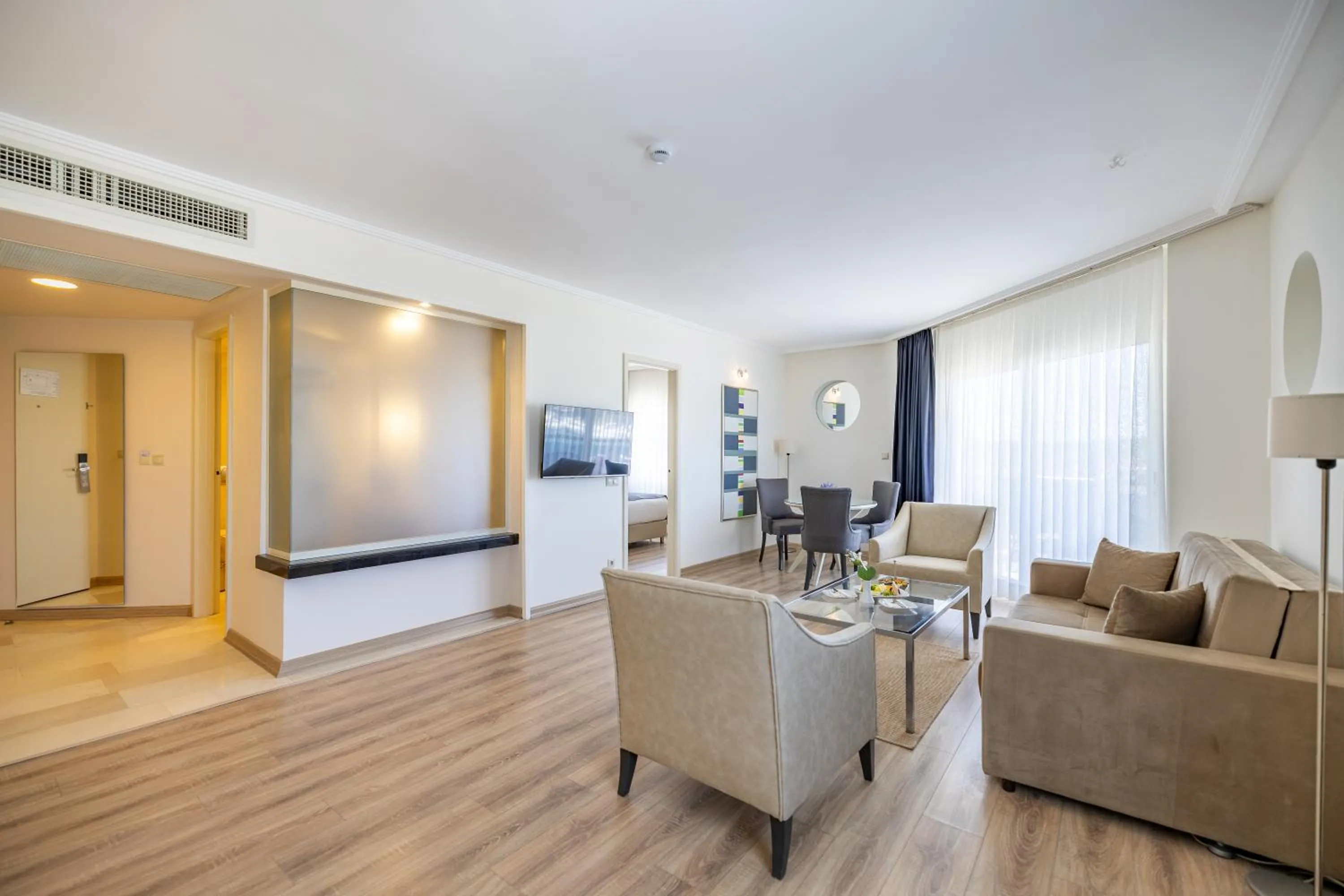 Communal lounge/ TV room in Sisus Marina Hotel