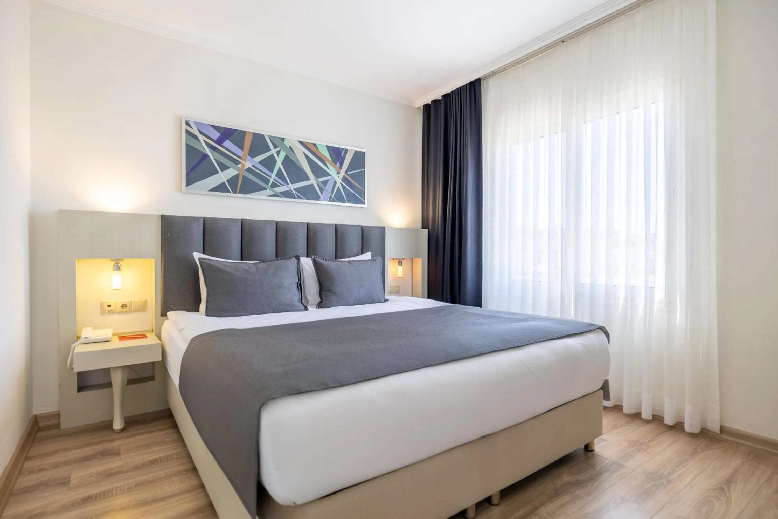 Bed in Sisus Marina Hotel