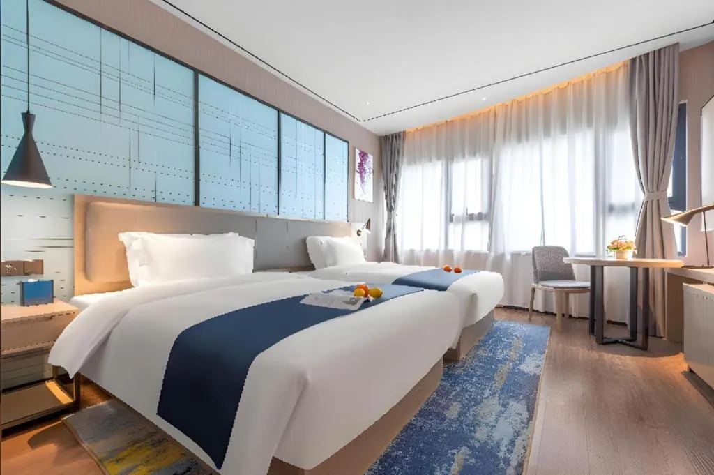 Bed in Echarm Hotel Zhuzhou Liling