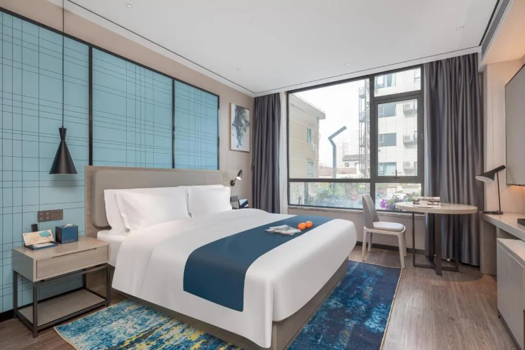 Bed in Echarm Hotel Zhuzhou Liling