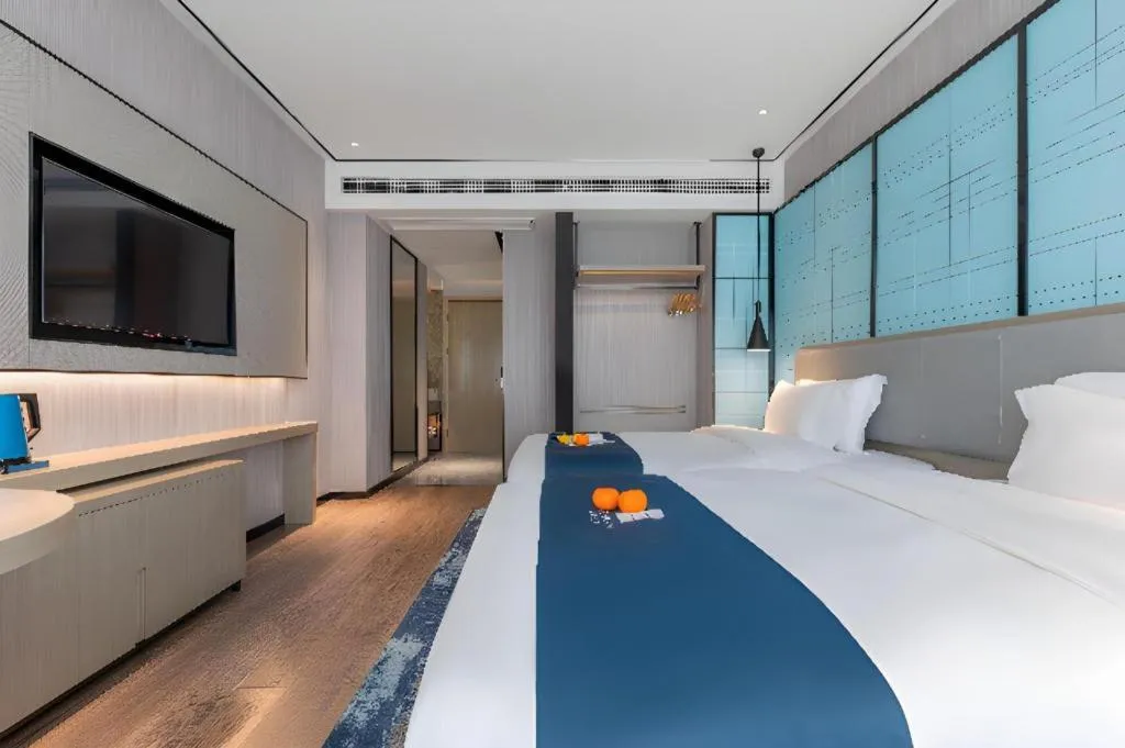 Bed in Echarm Hotel Zhuzhou Liling