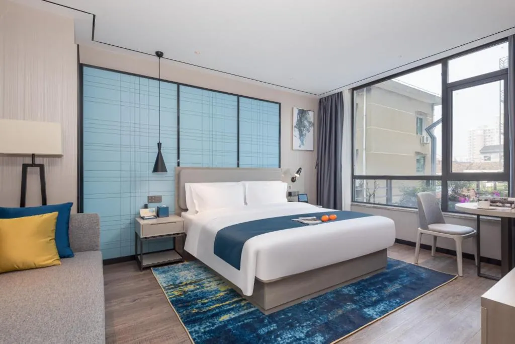 Bed in Echarm Hotel Zhuzhou Liling