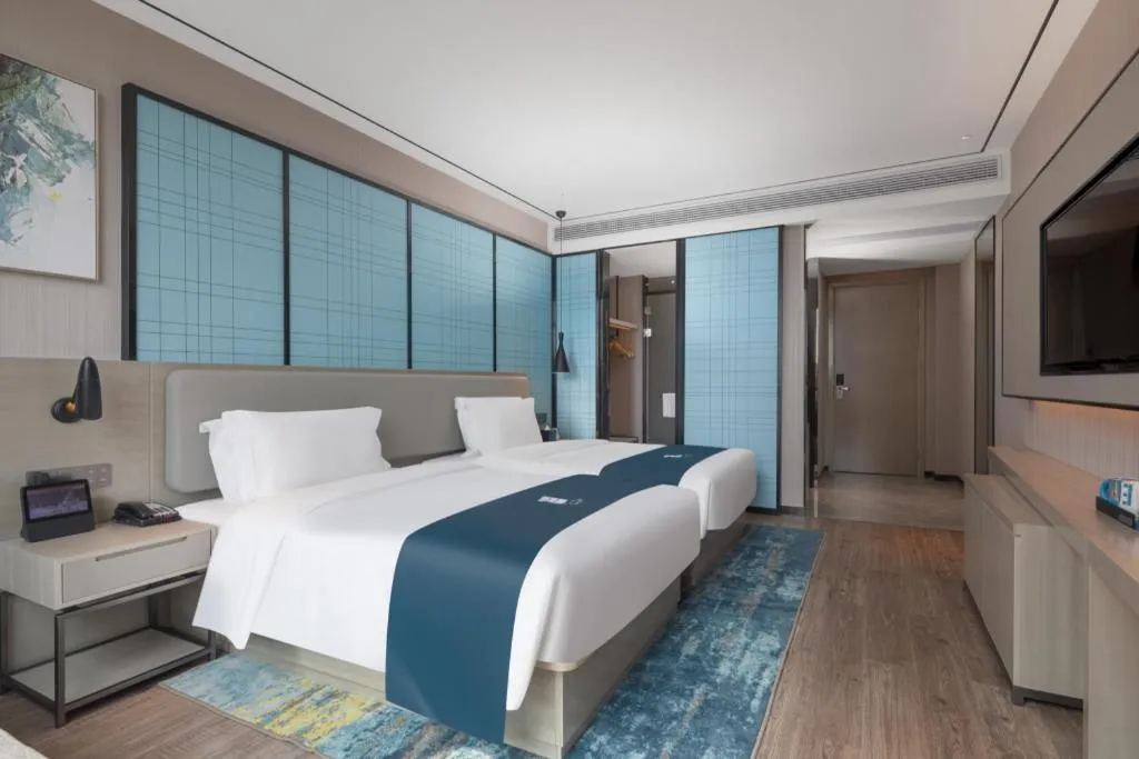 Bed in Echarm Hotel Zhuzhou Liling