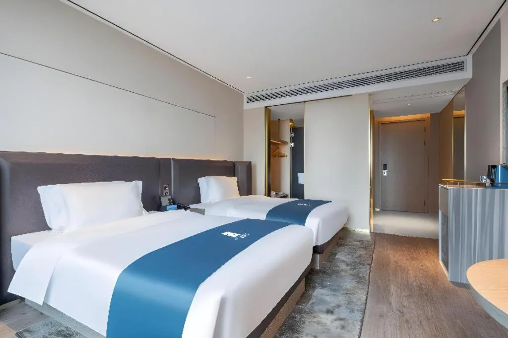 Bed in Echarm Hotel Zhuzhou Liling