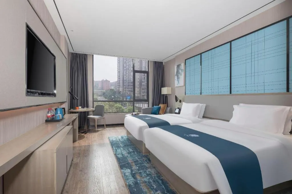 Bed in Echarm Hotel Zhuzhou Liling