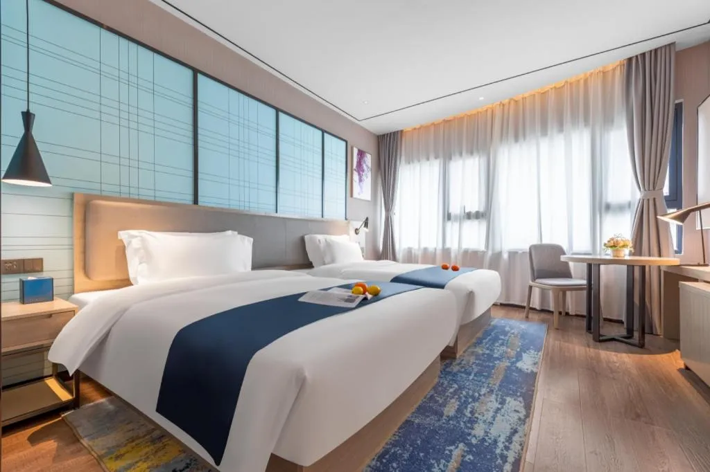 Bed in Echarm Hotel Zhuzhou Liling