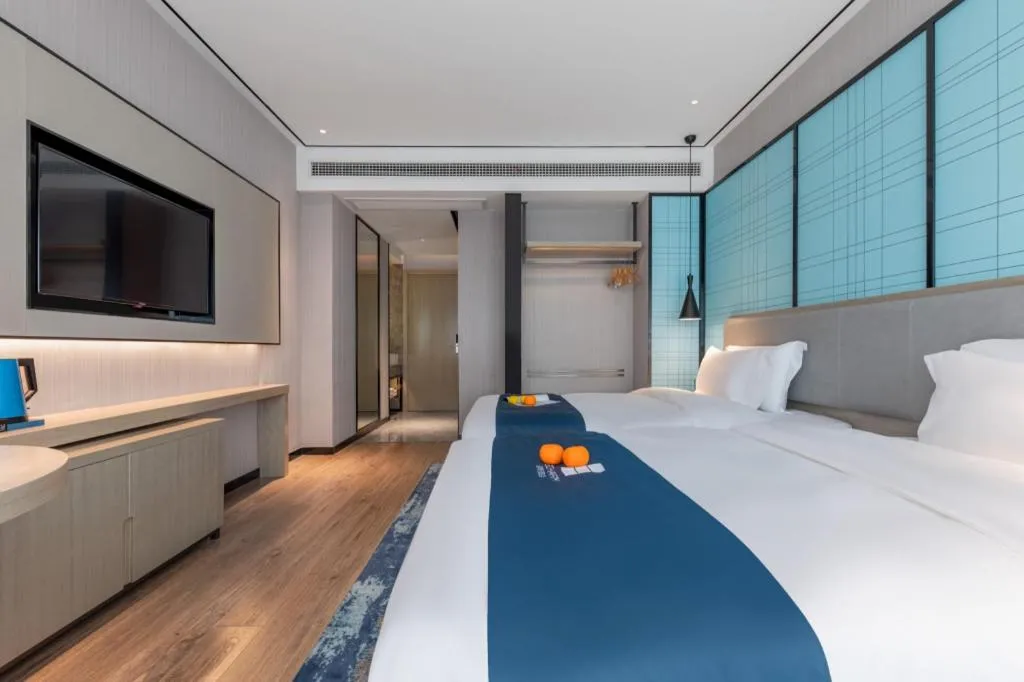 Bed in Echarm Hotel Zhuzhou Liling
