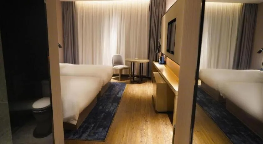 Bed in Echarm Hotel Zhuzhou Liling