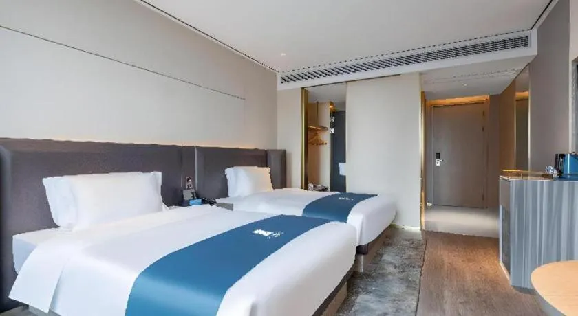 Bed in Echarm Hotel Zhuzhou Liling