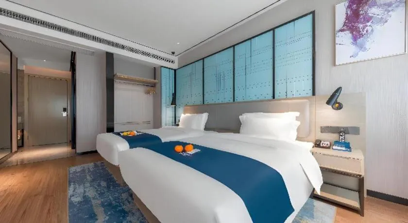 Bed in Echarm Hotel Zhuzhou Liling