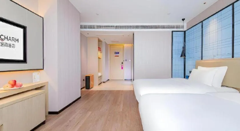 Bed in Echarm Hotel Wuhan Hankou Railway Station Zhuyeshan Metro Station