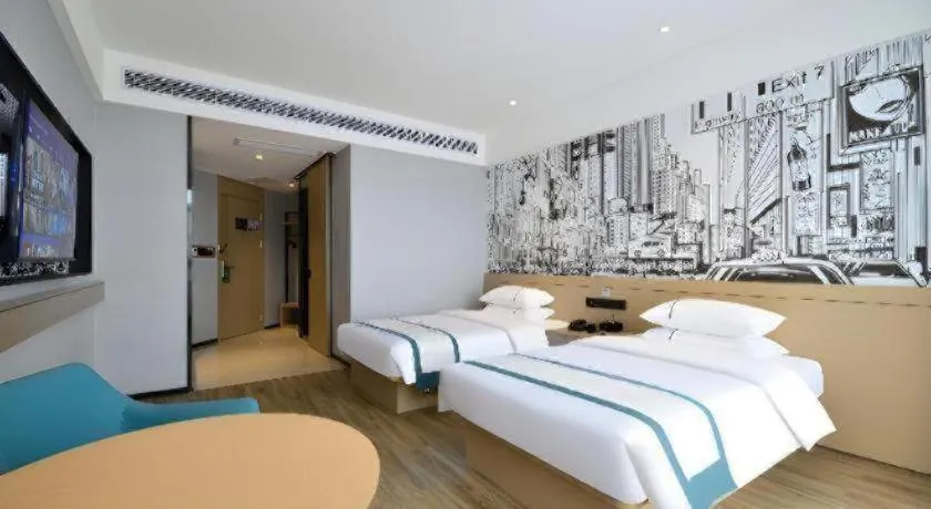 Bed in City Comfort Inn Yichang Sanxia Airport