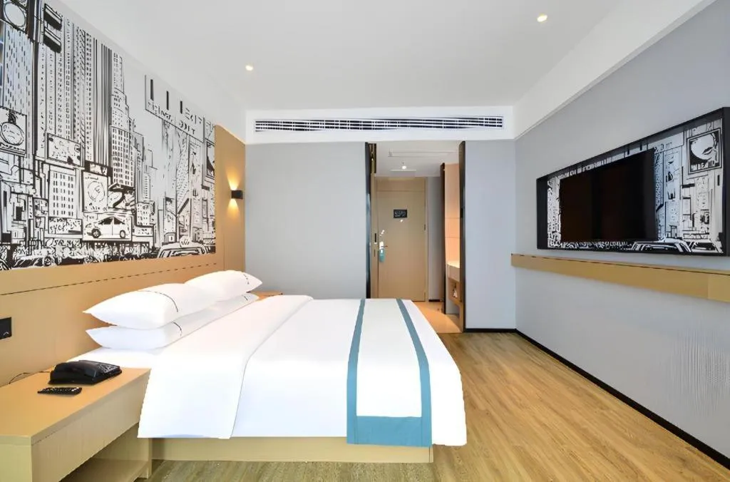 Bed in City Comfort Inn Yichang Sanxia Airport