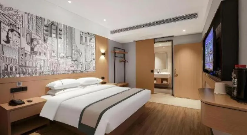 Bed in City Comfort Inn Yichang Sanxia Airport