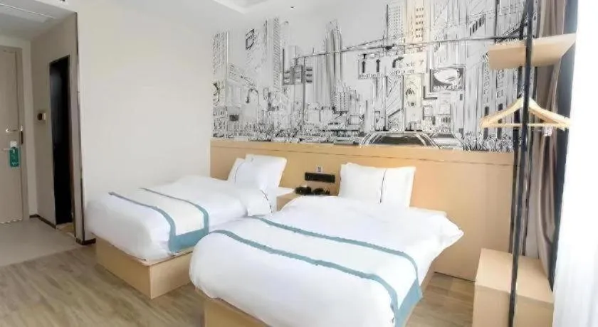 Bed in City Comfort Inn Jiujiang Gongqing Science and Technology College High-speed Railway Station