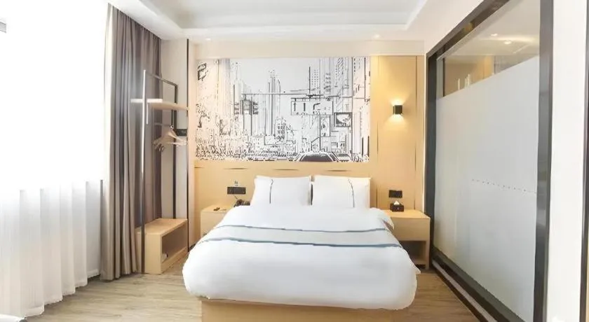 Bed in City Comfort Inn Jiujiang Gongqing Science and Technology College High-speed Railway Station
