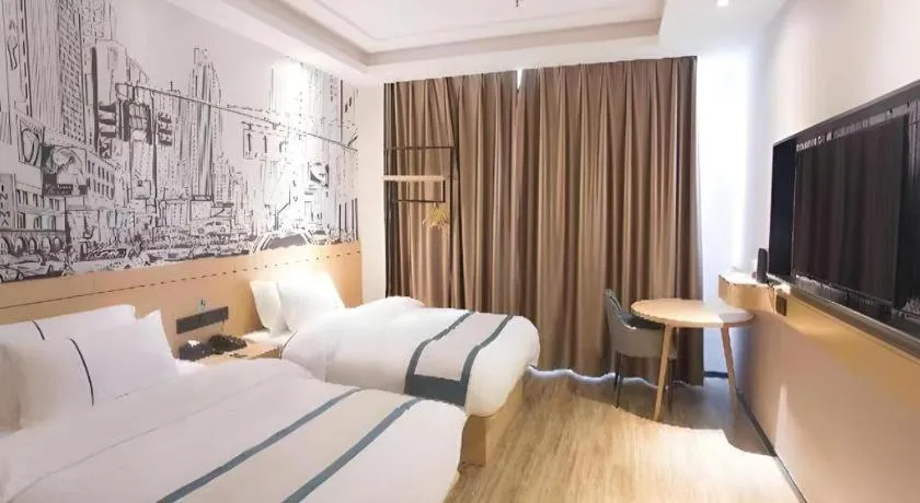 Bed in City Comfort Inn Jiujiang Gongqing Science and Technology College High-speed Railway Station