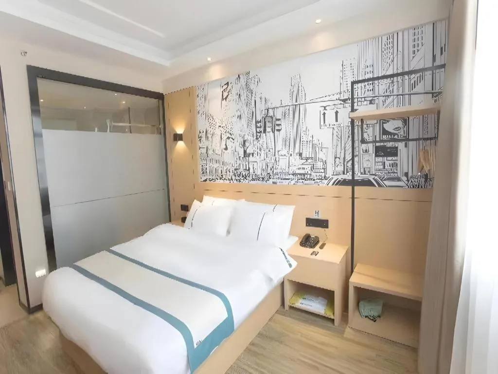 Bed in City Comfort Inn Jiujiang Gongqing Science and Technology College High-speed Railway Station