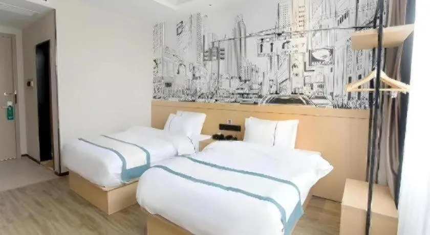 Bed in City Comfort Inn Jiujiang Gongqing Science and Technology College High-speed Railway Station