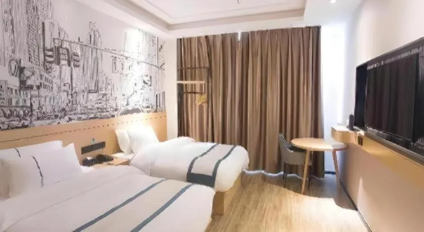 Bed in City Comfort Inn Jiujiang Gongqing Science and Technology College High-speed Railway Station