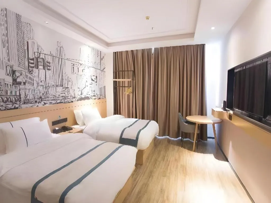 Bed in City Comfort Inn Jiujiang Gongqing Science and Technology College High-speed Railway Station