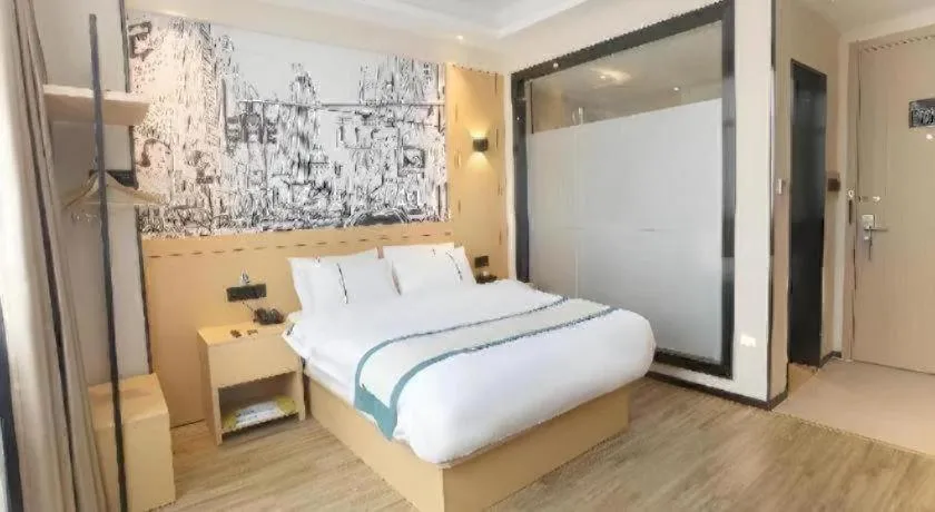 Bed in City Comfort Inn Jiujiang Gongqing Science and Technology College High-speed Railway Station