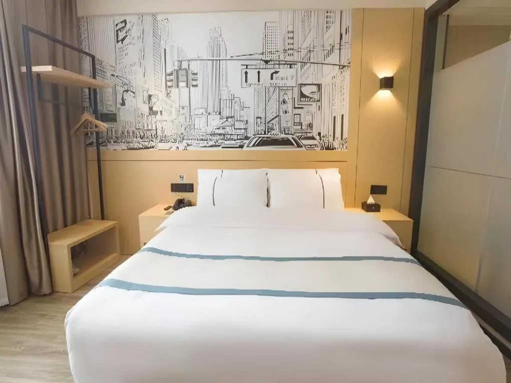Bed in City Comfort Inn Jiujiang Gongqing Science and Technology College High-speed Railway Station