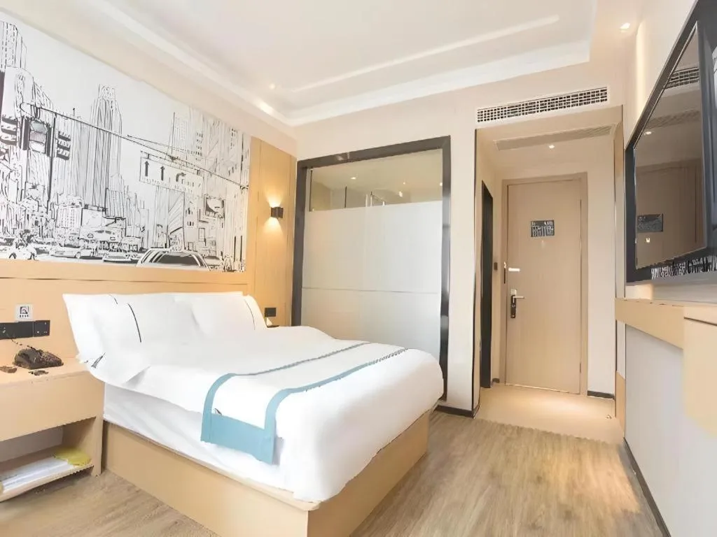 Bed in City Comfort Inn Jiujiang Gongqing Science and Technology College High-speed Railway Station