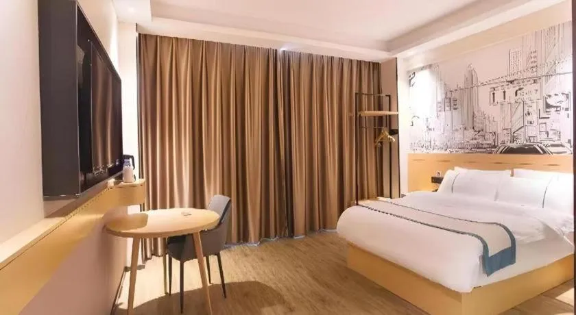 Bed in City Comfort Inn Jiujiang Gongqing Science and Technology College High-speed Railway Station